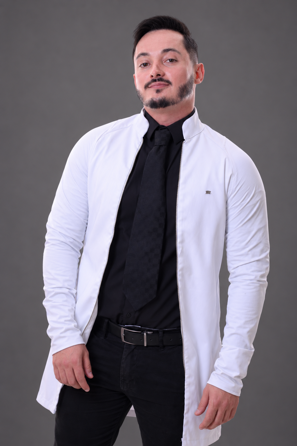 André Filipe Barbosa em retrato profissional com jaleco branco